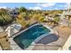 Aerial view of a sparkling private pool and lounge area in the backyard at 19240 N 90Th Pl, Scottsdale, AZ 85255