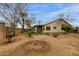 Expansive backyard with covered patio, desert landscaping, and block fence, perfect for outdoor living at 20333 N 108Th Ln, Peoria, AZ 85373