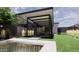 Stunning outdoor space featuring a pool, patio with pergola, and manicured landscaping at 2055 W Windsor Ave, Phoenix, AZ 85009