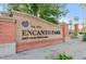 Encanto Park entrance sign with brick base and manicured landscaping at 2055 W Windsor Ave, Phoenix, AZ 85009