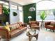 Cozy living room with stylish furniture, a decorative wall, and modern décor at 2055 W Windsor Ave, Phoenix, AZ 85009