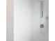 Close up of modern shower with white subway tile and chrome shower head at 2055 W Windsor Ave, Phoenix, AZ 85009