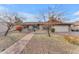 Charming single-story home with brick facade, manicured landscaping, and a welcoming walkway at 2447 E La Jolla Dr, Tempe, AZ 85282