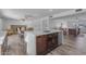 Spacious open concept kitchen with an island, dining area, and seamless flow into the living room at 2447 E La Jolla Dr, Tempe, AZ 85282