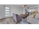 Inviting living room with tile floors, comfortable seating, and seamless flow to the kitchen at 2447 E La Jolla Dr, Tempe, AZ 85282