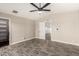 This bedroom features a ceiling fan, wood-look floors, and neutral paint at 245 S 56Th St # 262, Mesa, AZ 85206