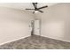 Bright bedroom featuring a modern ceiling fan and warm, wood-look floors at 245 S 56Th St # 262, Mesa, AZ 85206