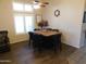 Inviting dining area boasting a modern table, stylish seating, and natural light at 265 E Liberty Ln, Gilbert, AZ 85296