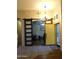 Bright foyer featuring neutral walls, decorative lighting, and a stylish front door at 265 E Liberty Ln, Gilbert, AZ 85296