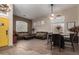 Inviting living area featuring tile and wood flooring, with ample seating and natural light at 265 E Liberty Ln, Gilbert, AZ 85296