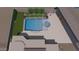 An aerial view shows a backyard oasis complete with pool, spa, and outdoor living spaces at 28304 N 141St Way, Scottsdale, AZ 85262
