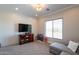 This bedroom features bright shiplap accent wall, large windows, and plush carpet for a warm and inviting atmosphere at 28304 N 141St Way, Scottsdale, AZ 85262