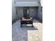 Inviting courtyard with a comfortable seating area, featuring modern outdoor furniture and decorative pillows at 28304 N 141St Way, Scottsdale, AZ 85262