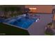 A luxurious pool features multiple fountains, a spa, and meticulous landscaping for a resort-like experience at 28304 N 141St Way, Scottsdale, AZ 85262