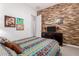 Bedroom showcasing a statement wood accent wall, modern dresser, and carpeted floors at 3202 N 197Th Ave, Buckeye, AZ 85396