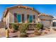 Charming single-story home with desert landscaping and a neutral color palette at 3202 N 197Th Ave, Buckeye, AZ 85396