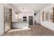 Modern kitchen featuring stainless steel appliances, granite countertops, bright lighting and easy access to the backyard at 3202 N 197Th Ave, Buckeye, AZ 85396