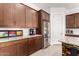 Stylish kitchen with granite countertops, stainless steel appliances, and a subway tile backsplash at 3202 N 197Th Ave, Buckeye, AZ 85396