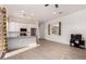 Open-concept living and kitchen area with natural light, stainless steel appliances, and easy access to the outdoor spaces at 3202 N 197Th Ave, Buckeye, AZ 85396
