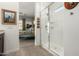 Beautiful shower featuring subway tiles, a small window, and modern fixtures at 3202 N 197Th Ave, Buckeye, AZ 85396