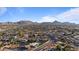 Panoramic aerial view of the neighborhood with beautiful mountain views in the background under a clear blue sky at 3834 E Shaw Butte Dr, Phoenix, AZ 85028