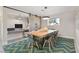 Dining area with large table with view to office at 3834 E Shaw Butte Dr, Phoenix, AZ 85028