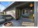 Inviting front porch with comfortable seating, stylish decor, and a welcoming entrance to the home at 3834 E Shaw Butte Dr, Phoenix, AZ 85028