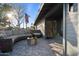 Charming front porch with a cozy lounge area, decorative fire pit, and a welcoming entrance with modern design elements at 3834 E Shaw Butte Dr, Phoenix, AZ 85028