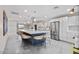 Bright open concept kitchen with large island, pendant lights, and stainless steel appliances at 3834 E Shaw Butte Dr, Phoenix, AZ 85028