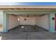 Spacious two-car garage with access door to side yard at 3925 W Harmont Dr, Phoenix, AZ 85051