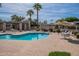 Refreshing community pool offers a relaxing retreat with ample seating and shaded areas at 4091 E Round Hill Dr, Phoenix, AZ 85028