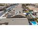 Aerial view of the back of a home with solar panels and backyard pool at 42660 W Oakland Dr, Maricopa, AZ 85138