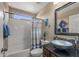 Modern bathroom featuring a stylish vessel sink, sleek vanity, and updated fixtures at 42660 W Oakland Dr, Maricopa, AZ 85138