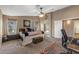 This main bedroom features carpeted floors, natural lighting, and a walk-in shower and tub at 42660 W Oakland Dr, Maricopa, AZ 85138