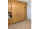 Bedroom featuring a spacious murphy bed, bookshelves and built in storage at 459 S Boojum Way, Mesa, AZ 85208