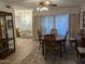 Bright dining area featuring wood table and neutral accents at 459 S Boojum Way, Mesa, AZ 85208