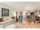 Cozy living room with neutral tones, wood floors, and comfortable seating arrangement at 459 S Boojum Way, Mesa, AZ 85208
