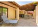 A comfortable outdoor patio space with lounging furniture for relaxation and a grill for outdoor cooking at 459 S Boojum Way, Mesa, AZ 85208