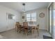 Cozy dining area with natural light, perfect for Gathering meals and gatherings at 4878 W Elijah Ln, San Tan Valley, AZ 85144