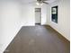 Neutral bedroom with a window, carpet flooring, and a closet at 517 S 125Th Ave, Avondale, AZ 85323