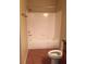 The bathroom features a combination shower and tub with white tile at 5335 E Shea Blvd # 1095, Scottsdale, AZ 85254