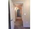 Hallway featuring neutral carpeting and white doors leading to other rooms at 5335 E Shea Blvd # 1095, Scottsdale, AZ 85254