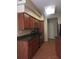 Kitchen with stainless steel appliances, granite countertops and cherry wood cabinets at 5335 E Shea Blvd # 1095, Scottsdale, AZ 85254
