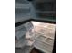 The refrigerator features adjustable shelves and door storage at 5335 E Shea Blvd # 1095, Scottsdale, AZ 85254
