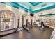 Bright gym space with state-of-the-art equipment, weights, and mirrors at 5345 E Van Buren St # 167, Phoenix, AZ 85008