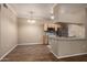 Eat-in kitchen features stainless appliances, granite counters, and wood cabinetry at 5345 E Van Buren St # 167, Phoenix, AZ 85008