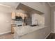 Bright kitchen with stainless steel appliances, granite countertops, and ample cabinet space at 5345 E Van Buren St # 167, Phoenix, AZ 85008