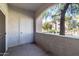Relaxing patio with views of lush landscaping and a tranquil pond with a water feature at 5345 E Van Buren St # 167, Phoenix, AZ 85008