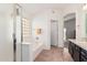 Bathroom has a bathtub and tiled floors with a glass block window for natural light at 6965 E Hacienda La Noria Ln, Gold Canyon, AZ 85118