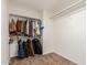 Walk-in closet offering ample storage space with installed shelving and racks at 6965 E Hacienda La Noria Ln, Gold Canyon, AZ 85118